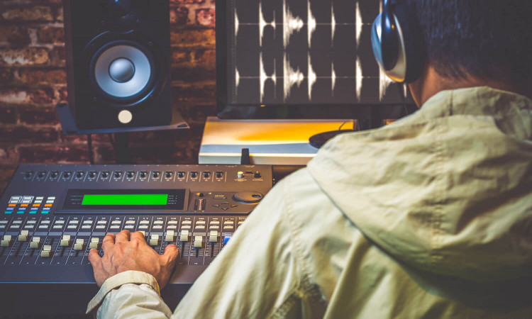 Which material does a composer need to begin scoring a film